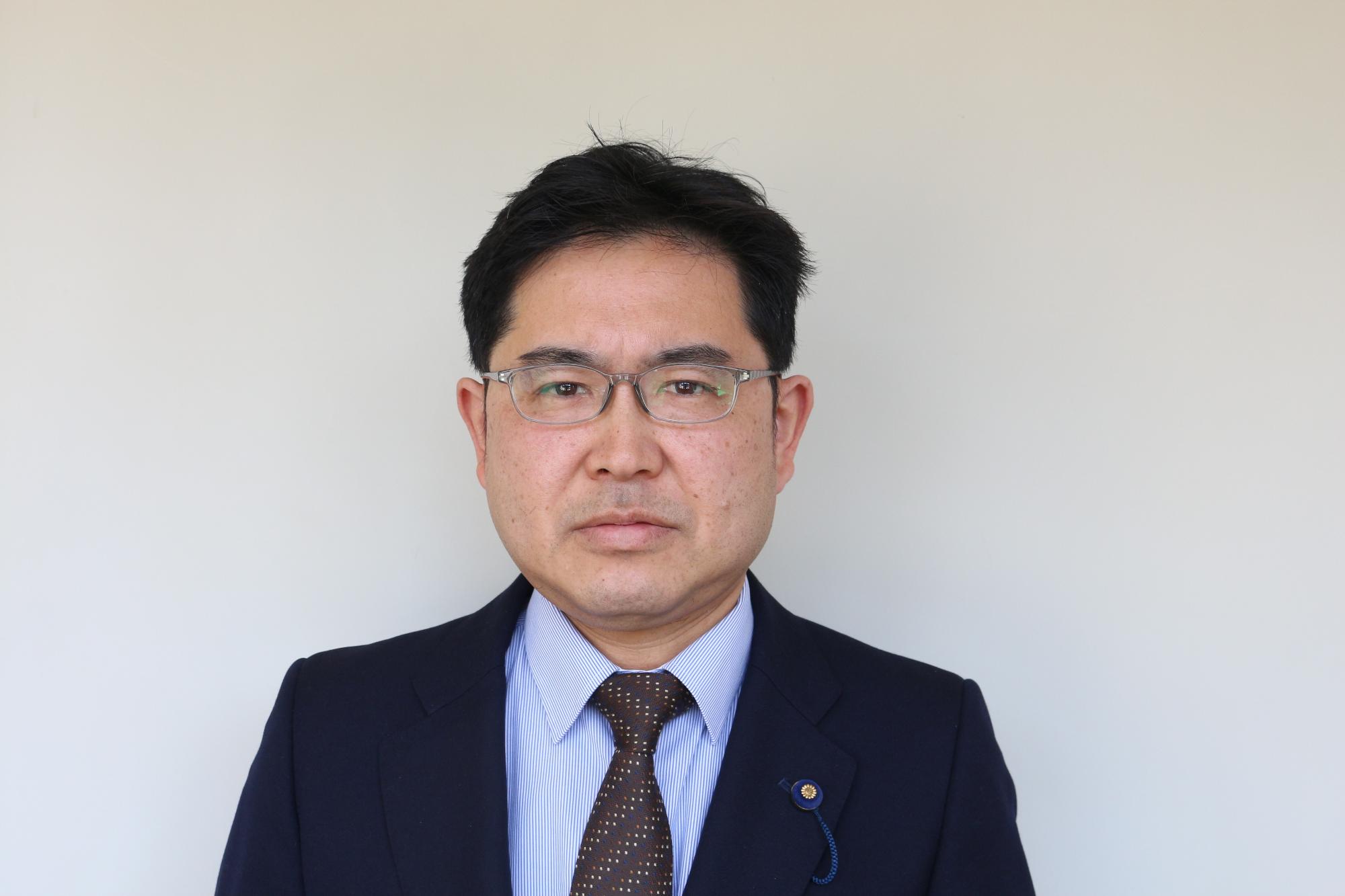 川岸真喜議員の顔写真